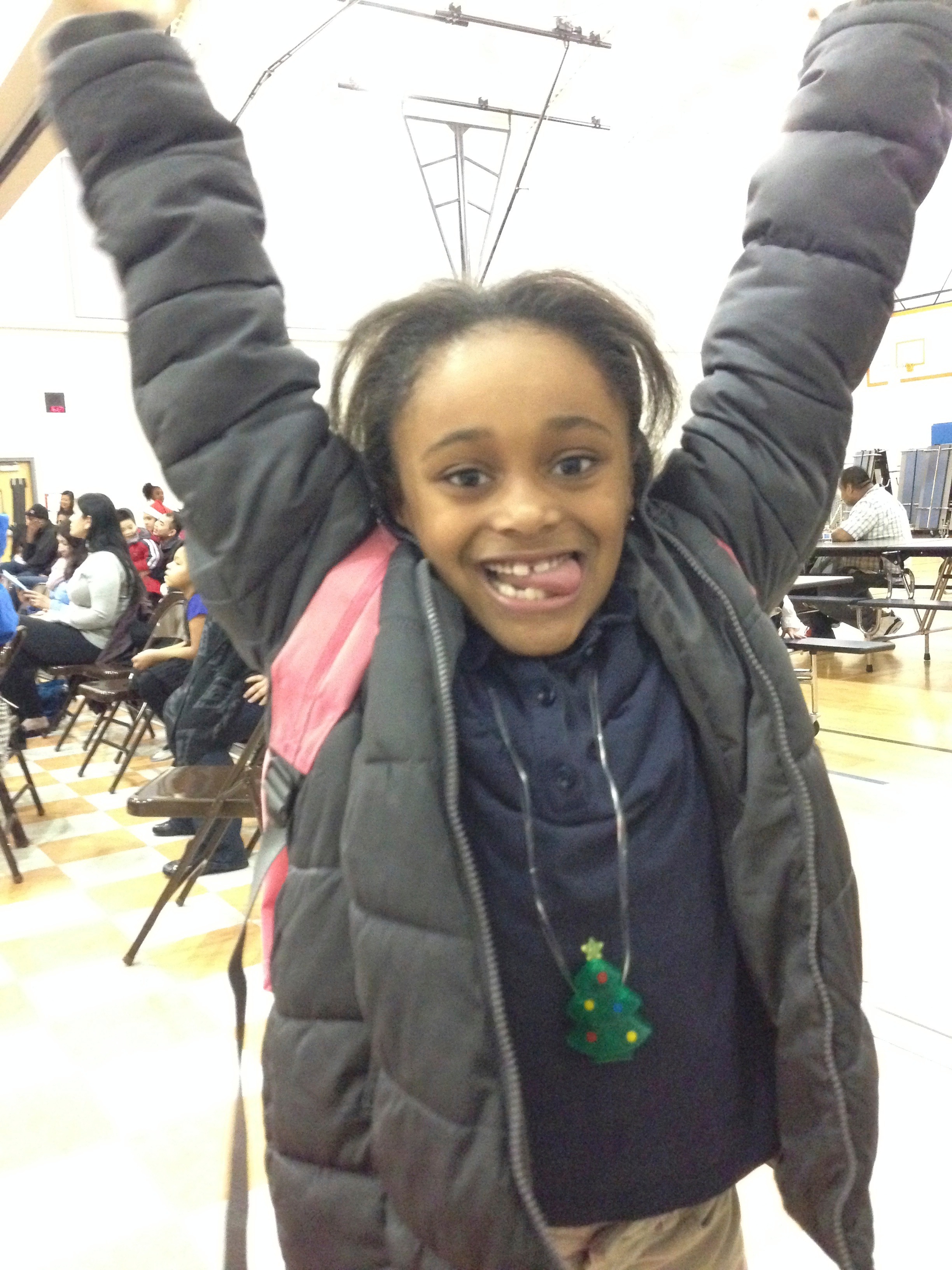 Alivia, an energetic second grader at Emerson, taking the jumping jack challenge!