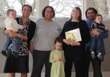 Anita Alokolaro with her daughters & three of her grandchildren, as she accepted a Solid Ground Service Award
