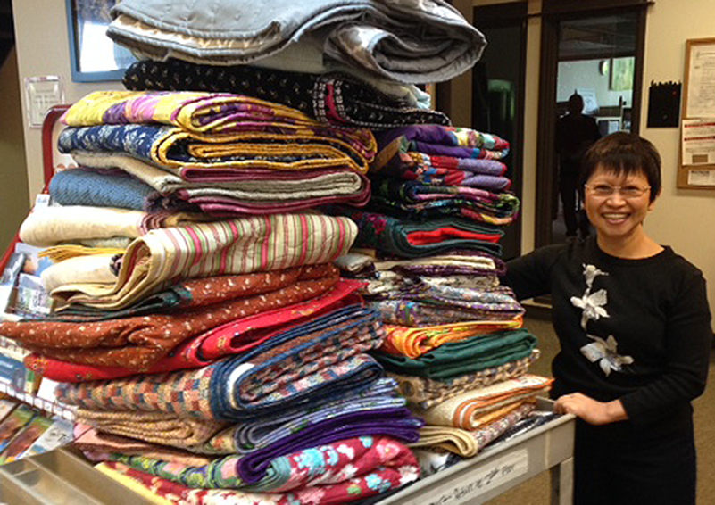 Quilts From The Heart donated 35 handmade quilts to Solid Ground's Family Shelter.