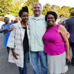 Shanelle with her husband, Mike West, and Reagen Price (l), Solid Ground's Anti-Racism Initiative Manager