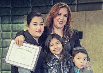 Maricela (center) with three of her four children (l to r): Maira, Jocelyn and Jonathan (photo by Bellen Drake)