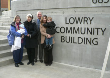 Mike Lowry and family at April 2011 dedication of Sand Point Housing campus.