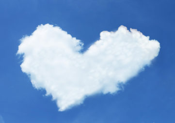 heart-shaped cloud on deep blue sky