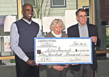 Cloud 9 Fund of St. Stephen's Episcopal Parish present a check for $100,000 to Solid Ground