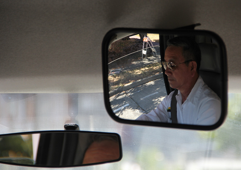 Circulator driver, Phuong Nguyen in rearview mirror (photo by Lara Breitkreutz)
