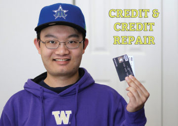 Credit & Credit Repair: Young man with glasses in a blue cap and UW sweatshirt holds up his credit card