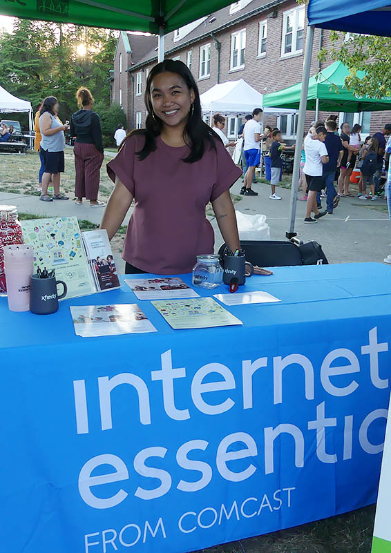 Angielene Savini, Comcast Internet Essentials Ambassador, signed families up for high-speed internet.