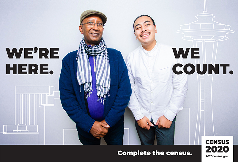 US Census poster picturing two men w/ the text: "We're here, we count."