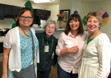 A fun Volunteer meetup at Northshore Senior Center-Mill Creek location with four volunteers pictured