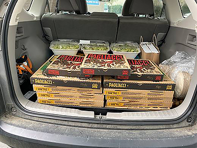 Pizza boxes ready for the donation