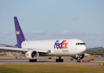 A FedEx airplane on a runway