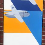 A tall narrow painting of two airplanes