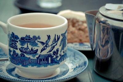 Steaming tea in a blue and white cup.