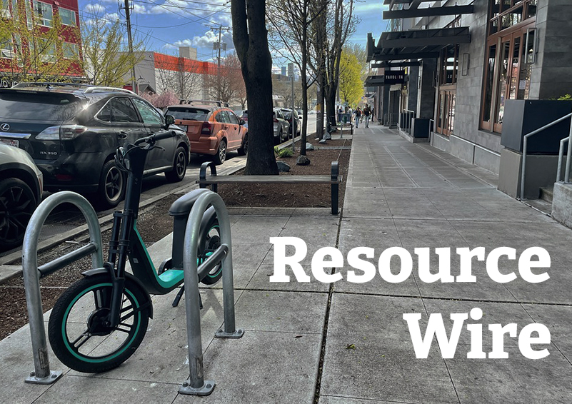 A scooter with street trees along a sidewalk with the words "Resource Wire" embossed over it.