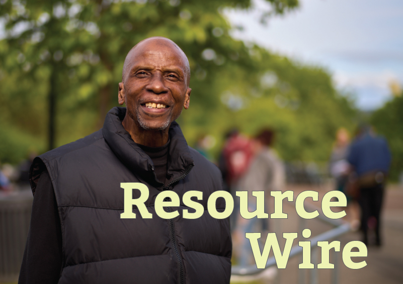 A smiling man in a black vest with the words "Resource Wire"