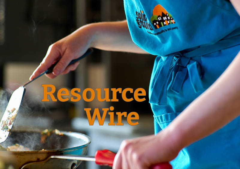 A close up shot of someone in a blue apron stirring something in a frying pan with a spatula. The words "Resource Wire" appear besides them.