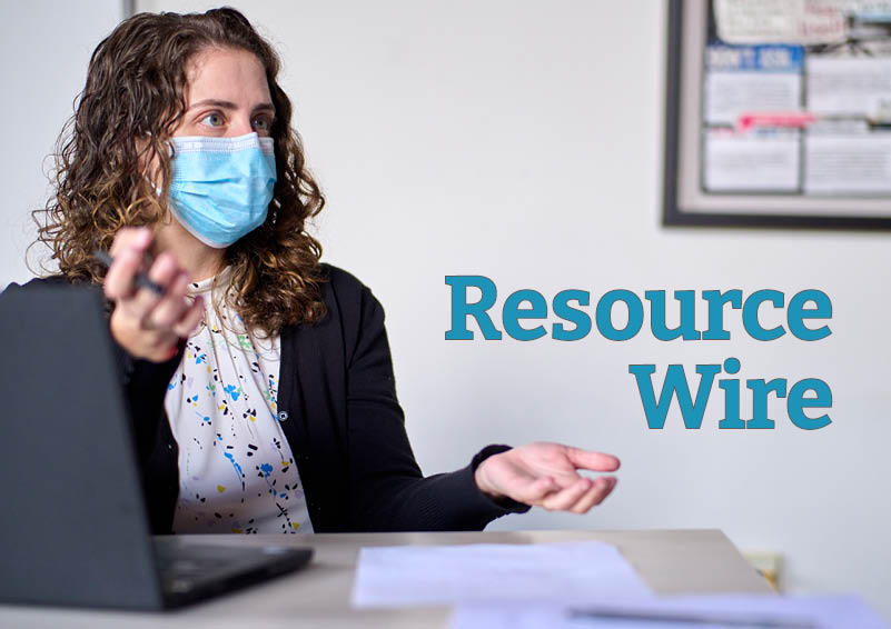 A woman in front of a laptop gestures with her hands as she talked to someone off camera. The words "Resource Wire" appear next to her.