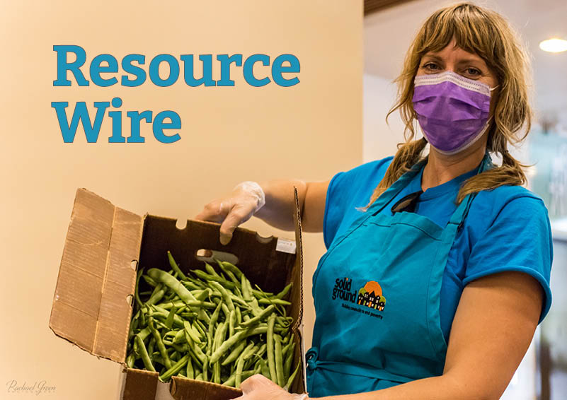 A woman in a teal-colored apron with the Solid Ground logo on it holds up a big cardboard box full or green beans. The words "Resource Wire" appear above her.