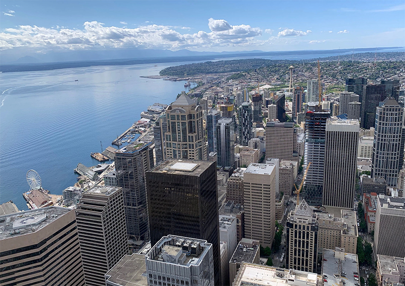 View of the downtown Seattle waterfront from the top of the tallest building in the city.
