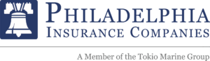 Blue and grey logo with a Liberty Bell graphic and text reading PHILADELPHIA INSURANCE Companies, A Member of the Tokio Marine Group