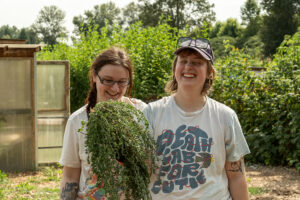 Two volunteers at the farm.